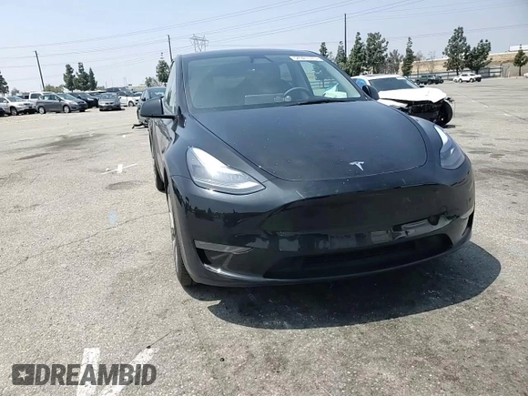 2024 Tesla Model Y Long Range with VIN 7SAYGDEE4RA228916, listed as a Copart auction lot 54921575 with 13,607 mi miles and Salvage title. Bid and sale history available at DreamBid. Image 14.