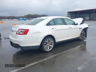 2014 Ford Taurus Limited with VIN 1FAHP2F80EG183153, listed as a IAAI auction lot 40860378 with 163,294 mi miles. Bid and sale history available at carsss.com. Image 4.