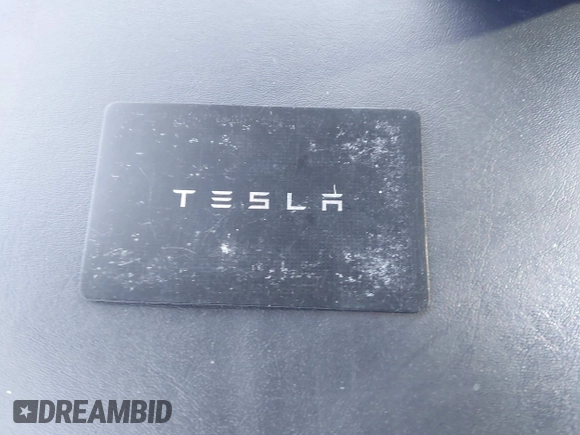 2022 Tesla Model 3 with VIN 5YJ3E1EA2NF245817, listed as a IAAI auction lot 41976493 with 32,710 mi miles and . Bid and sale history available at DreamBid. Image 11.