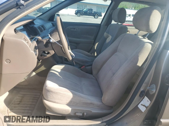 1999 Toyota Camry LE z VIN JT2BG22K0X0295893, wystawiony jako Copart lot #56183655 z przebiegiem 327 172 mil mil oraz Szkoda całkowita • Salvage title. Historia ofert i sprzedaży dostępna na DreamBid. Obrazek 7.