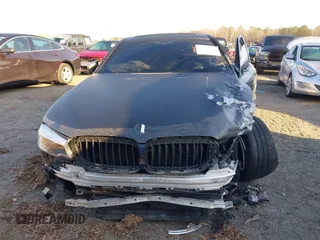 2019 BMW 5 Series M550i xDrive with VIN WBAJB9C50KB464159, listed as a IAAI auction lot 41758879 with 9,000 mi miles and . Bid and sale history available at DreamBid. Image 13.