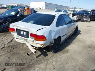 1996 Honda Civic DX with VIN 1HGEJ6120TL059446, listed as a IAAI auction lot 41748406 with 320,383 mi miles. Bid and sale history available at carsss.com. Image 4.