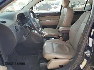 2014 Jeep Compass High Altitude with VIN 1C4NJCEA5ED790370, listed as a Copart auction lot 48593115 with 170,976 mi miles and Clean Title. Bid and sale history available at carsss.com. Image 7.