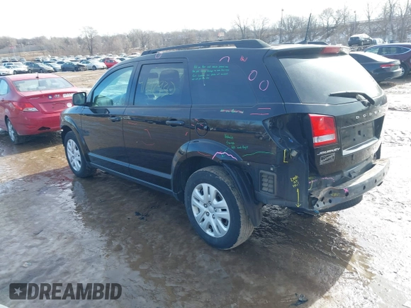 2019 Dodge Journey SE with VIN 3C4PDCBB1KT694545, listed as a IAAI auction lot 41642930 with 103,935 mi miles and . Bid and sale history available at DreamBid. Image 3.