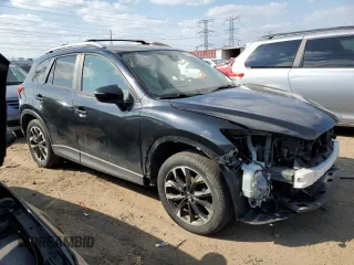 2016 Mazda CX-5 Grand Touring with VIN JM3KE4DY8G0719113, listed as a Copart auction lot 52160285 with 259,365 mi miles and Salvage Title. Bid and sale history available at carsss.com. Image 4.