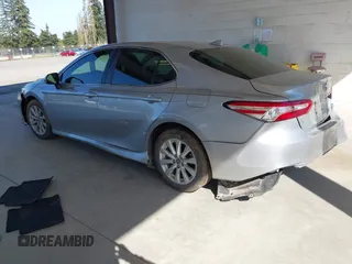 2020 Toyota Camry LE with VIN 4T1C11AKXLU381686, listed as a IAAI auction lot 42013767 with 32,603 mi miles. Bid and sale history available at carsss.com. Image 3.