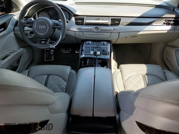 2015 Audi S8 z VIN WAUK2AFD3FN015524, wystawiony jako Copart lot #58506754 z przebiegiem 69 866 mil mil oraz Szkody całkowita. Historia ofert i sprzedaży dostępna na DreamBid. Obrazek 8.