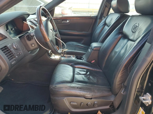 2007 Cadillac DTS Luxury I z VIN 1G6KD57Y87U135769, wystawiony jako Copart lot #53678095 z przebiegiem 134 052 mil mil oraz Nie do naprawy • Non repairable. Historia ofert i sprzedaży dostępna na DreamBid. Obrazek 7.
