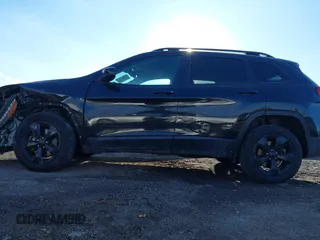 2016 Jeep Cherokee Latitude with VIN 1C4PJMCB1GW153316, listed as a IAAI auction lot 41430871 with 107,684 mi miles and . Bid and sale history available at carsss.com. Image 15.