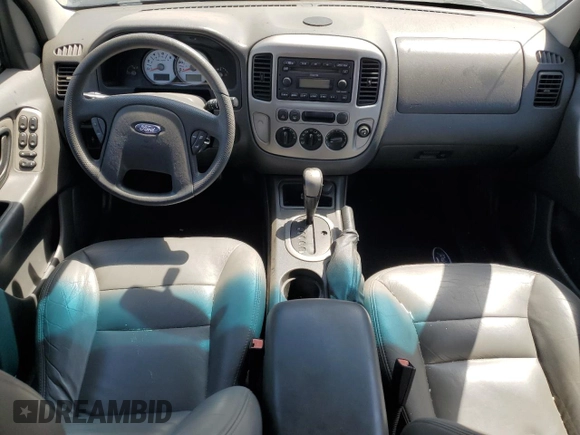 2005 Ford Escape XLT z VIN 1FMYU03155KB11291, wystawiony jako Copart lot #52246495 z przebiegiem Nie podano mil oraz Szkoda całkowita • Salvage title. Historia ofert i sprzedaży dostępna na DreamBid. Obrazek 8.