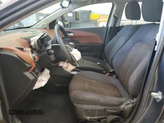 2012 Chevrolet Sonic LT with VIN 1G1JC5SH3C4192144, listed as a Copart auction lot 60973395 with 141,306 mi miles and Salvage title. Bid and sale history available at DreamBid. Image 7.