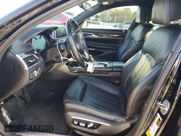 2016 BMW 7 Series 750i with VIN WBA7F0C5XGGL99048, listed as a Copart auction lot 84815364 with 96,743 mi miles and Salvage Title. Bid and sale history available at carsss.com. Image 7.