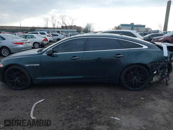 2015 Jaguar XJ Portfolio z VIN SAJWJ2GD7F8V84372, wystawiony jako IAAI lot #41489177 z przebiegiem 78 891 mil mil oraz . Historia ofert i sprzedaży dostępna na DreamBid. Obrazek 14.