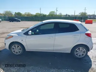 2014 Mazda 2 Sport with VIN JM1DE1KY0E0175562, listed as a IAAI auction lot 42023803 with 247,411 mi miles and . Bid and sale history available at carsss.com. Image 14.