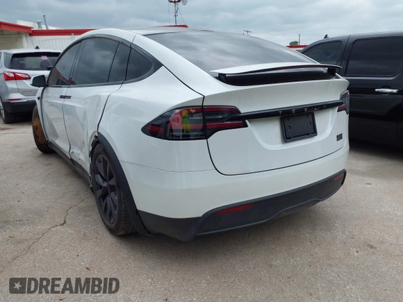 2024 Tesla Model X Plaid with VIN 7SAXCBE63RF440245, listed as a IAAI auction lot 42140051 with Not Provided miles and . Bid and sale history available at DreamBid. Image 3.