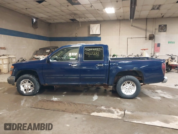 2011 GMC Canyon SLE1 with VIN 1GTH6MFE3B8123808, listed as a IAAI auction lot 41611231 with 142,877 mi miles. Bid and sale history available at carsss.com. Image 14.