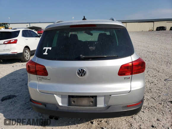2016 Volkswagen Tiguan S z VIN WVGAV7AX3GW504720, wystawiony jako Copart lot #59842795 z przebiegiem 103 670 mil mil oraz Czysty tytuł • Clean title. Historia ofert i sprzedaży dostępna na DreamBid. Obrazek 6.