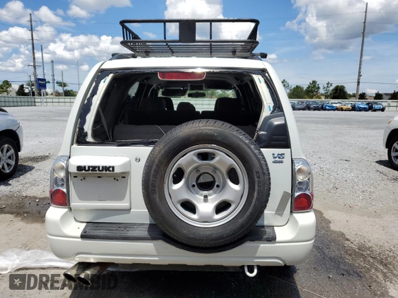 2004 Suzuki XL7 LX with VIN JS3TX92V444107106, listed as a Copart auction lot 62322035 with 94,380 mi miles and Salvage title. Bid and sale history available at DreamBid. Image 6.