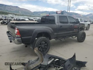2014 Toyota Tacoma with VIN 3TMMU4FNXEM064955, listed as a Copart auction lot 57435005 with 120,967 mi miles and Salvage title. Bid and sale history available at DreamBid. Image 3.