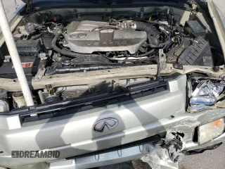 2001 Infiniti QX4 z VIN JNRDR09X51W201432, wystawiony jako Copart lot #54083295 z przebiegiem 211 929 mil mil oraz Szkoda całkowita • Salvage title. Historia ofert i sprzedaży dostępna na DreamBid. Obrazek 12.