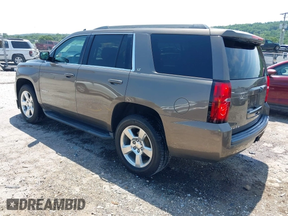 2016 Chevrolet Tahoe LT z VIN 1GNSCBKC8GR210829, wystawiony jako IAAI lot #42459936 z przebiegiem 160 518 mil mil oraz . Historia ofert i sprzedaży dostępna na DreamBid. Obrazek 3.