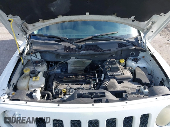 2014 Jeep Patriot Sport with VIN 1C4NJPBBXED671220, listed as a IAAI auction lot 42163245 with 216,848 mi miles. Bid and sale history available at carsss.com. Image 10.