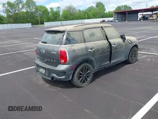2014 MINI Countryman S with VIN WMWZC3C59EWP25041, listed as a IAAI auction lot 42085698 with 109,320 mi miles and . Bid and sale history available at DreamBid. Image 4.