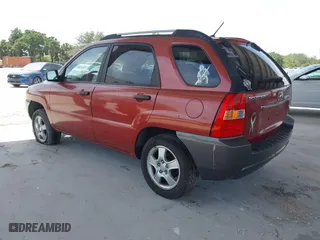 2007 Kia Sportage LX with VIN KNDJF724477440302, listed as a IAAI auction lot 42095210 with 115,854 mi miles. Bid and sale history available at carsss.com. Image 3.