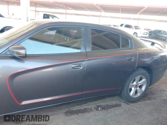 2014 Dodge Charger SE with VIN 2C3CDXBG5EH191748, listed as a IAAI auction lot 41882271 with 140,952 mi miles. Bid and sale history available at carsss.com. Image 14.