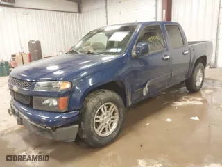 2012 Chevrolet Colorado LT w/1LT with VIN 1GCHTCFE0C8105626, listed as a IAAI auction lot 41559244 with 147,731 mi miles. Bid and sale history available at carsss.com. Image 2.