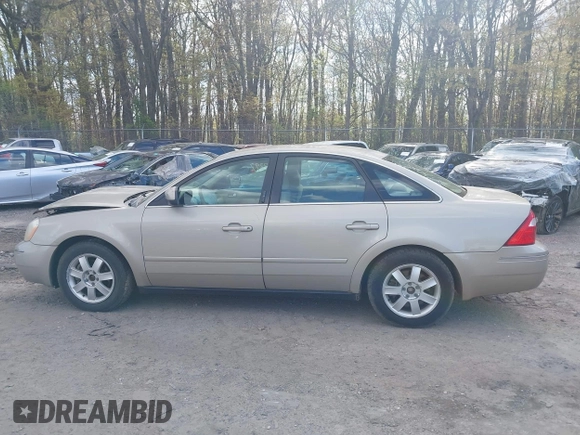 2005 Ford Five Hundred SE z VIN 1FAFP23115G121341, wystawiony jako IAAI lot #42027397 z przebiegiem 110 851 mil mil oraz . Historia ofert i sprzedaży dostępna na DreamBid. Obrazek 15.