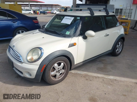 2010 MINI Hardtop with VIN WMWMF3C53ATZ25765, listed as a IAAI auction lot 42805681 with 108,796 mi miles and . Bid and sale history available at DreamBid. Image 2.
