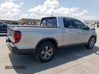 2021 Honda Ridgeline RTL-E with VIN 5FPYK3F73MB008806, listed as a Copart auction lot 62234825 with 84,716 mi miles and Salvage title. Bid and sale history available at DreamBid. Image 3.