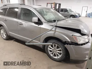 2016 Dodge Journey SXT with VIN 3C4PDCBG0GT198686, listed as a IAAI auction lot 41561007 with 85,289 mi miles. Bid and sale history available at carsss.com. Image 1.