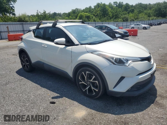 2018 Toyota C-HR XLE with VIN NMTKHMBX6JR027395, listed as a Copart auction lot 63071605 with 124,293 mi miles and Clean title. Bid and sale history available at DreamBid. Image 4.