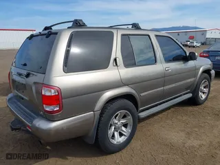 2004 Nissan Pathfinder SE with VIN JN8DR09X94W802254, listed as a IAAI auction lot 42048063 with 199,012 mi miles. Bid and sale history available at carsss.com. Image 4.