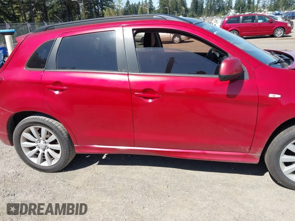 2011 Mitsubishi Outlander Sport SE with VIN JA4AP4AU3BZ022916, listed as a IAAI auction lot 42036738 with 145,070 mi miles. Bid and sale history available at carsss.com. Image 13.