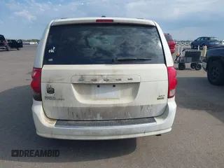 2016 Dodge Grand Caravan SXT with VIN 2C4RDGCG9GR380632, listed as a IAAI auction lot 42239479 with 197,316 mi miles and . Bid and sale history available at DreamBid. Image 16.
