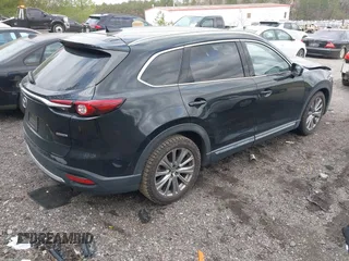 2021 Mazda CX-9 Carbon Edition with VIN JM3TCADY4M0517535, listed as a IAAI auction lot 41821261 with 60,053 mi miles. Bid and sale history available at carsss.com. Image 4.