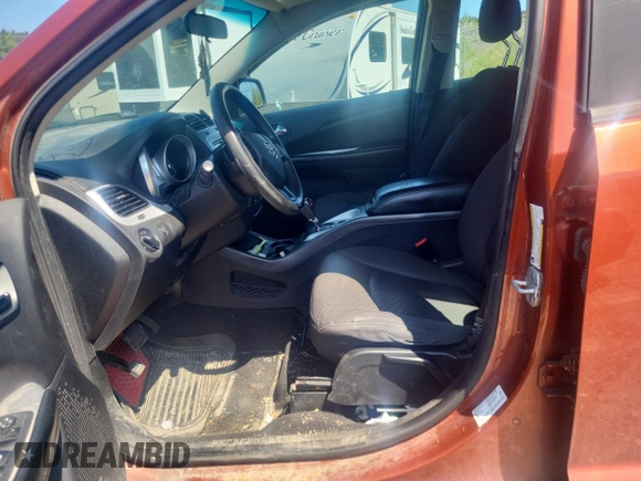 2013 Dodge Journey American Value z VIN 3C4PDCAB1DT656317, wystawiony jako Copart lot #58525885 z przebiegiem 210 834 mil mil oraz Szkoda całkowita • Salvage title. Historia ofert i sprzedaży dostępna na DreamBid. Obrazek 7.