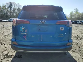 2016 Toyota RAV4 Hybrid XLE with VIN JTMRJREV4GD003211, listed as a Copart auction lot 52111305 with 79,404 mi miles and Salvage Title. Bid and sale history available at carsss.com. Image 6.