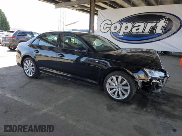 2018 Audi A4 Premium with VIN WAUDNAF45JN009698, listed as a Copart auction lot 56996875 with 39,134 mi miles and Salvage title. Bid and sale history available at DreamBid. Image 4.