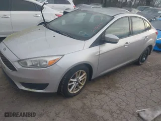 2015 Ford Focus SE with VIN 1FADP3F23FL276810, listed as a IAAI auction lot 41799093 with 127,048 mi miles. Bid and sale history available at carsss.com. Image 2.