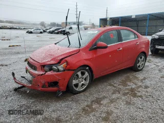 2013 Chevrolet Sonic LTZ z VIN 1G1JE5SH7D4184799, wystawiony jako Copart lot #44421685 z przebiegiem Nie podano mil oraz Szkoda całkowita • Salvage title. Historia ofert i sprzedaży dostępna na DreamBid. Obrazek 1.