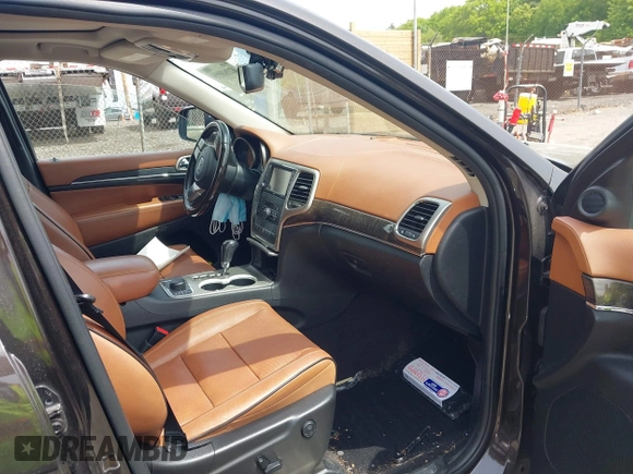2011 Jeep Grand Cherokee Overland z VIN 1J4RR6GT2BC700758, wystawiony jako IAAI lot #42260235 z przebiegiem 98 609 mil mil oraz . Historia ofert i sprzedaży dostępna na DreamBid. Obrazek 5.