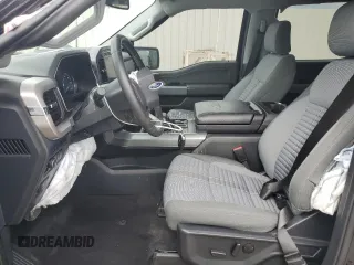 2023 Ford F-150 XL with VIN 1FTFW1E84PKE35275, listed as a Copart auction lot 61867535 with 22,142 mi miles and Salvage title. Bid and sale history available at DreamBid. Image 7.