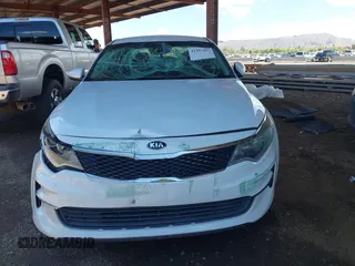 2017 Kia Optima LX with VIN 5XXGT4L37HG176394, listed as a IAAI auction lot 42397417 with 82,310 mi miles and . Bid and sale history available at DreamBid. Image 12.