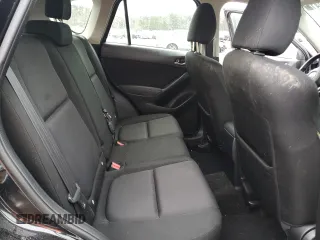 2014 Mazda CX-5 Sport with VIN JM3KE2BEXE0378744, listed as a Copart auction lot 86397414 with 101,011 mi miles and Salvage Title. Bid and sale history available at carsss.com. Image 11.