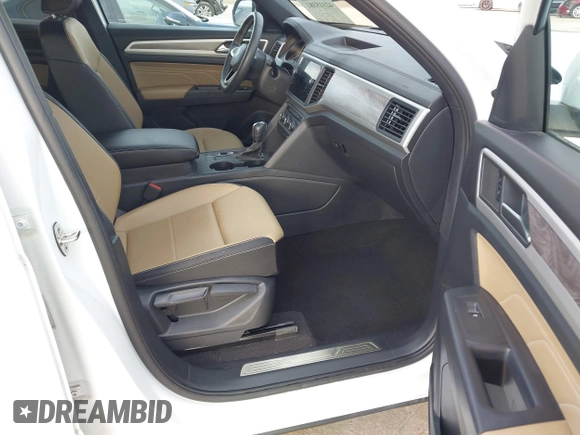 2021 Volkswagen Atlas SE with VIN 1V2JE2CA4MC232349, listed as a IAAI auction lot 42315381 with 32,755 mi miles and . Bid and sale history available at DreamBid. Image 5.