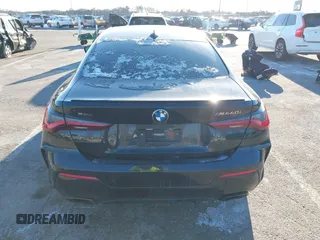2021 BMW 4 Series M440i xDrive with VIN WBA13AR0XMCF50380, listed as a IAAI auction lot 41200404 with 26,102 mi miles and . Bid and sale history available at DreamBid. Image 16.